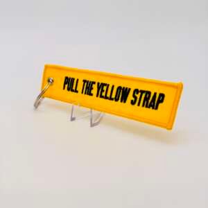 Porte clé "Pull the yellow strap"